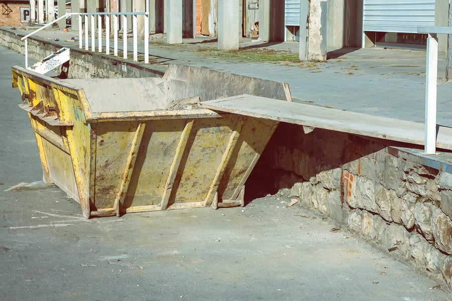 Yellow skip with ramp